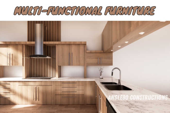 Angle90 Consatructions in Coimbatore specializes in creating multi-functional furniture designs for modern kitchens. This image displays a sleek kitchen setup featuring modular wooden cabinetry, integrated lighting, and efficient storage solutions for a streamlined look.