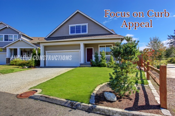 Beautiful modern home with well-maintained front yard and strong curb appeal, enhanced by Angle90 Constructions in Coimbatore