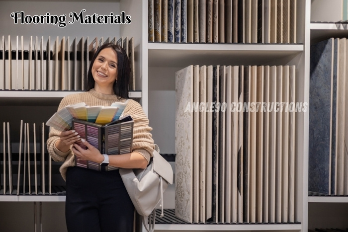 Angle90 Constructions in Coimbatore for Interior designer selecting flooring material samples at a showroom
