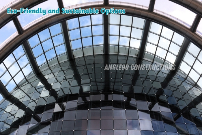 Eco-friendly glass facade and sustainable building design by Angle90 Constructions in Coimbatore