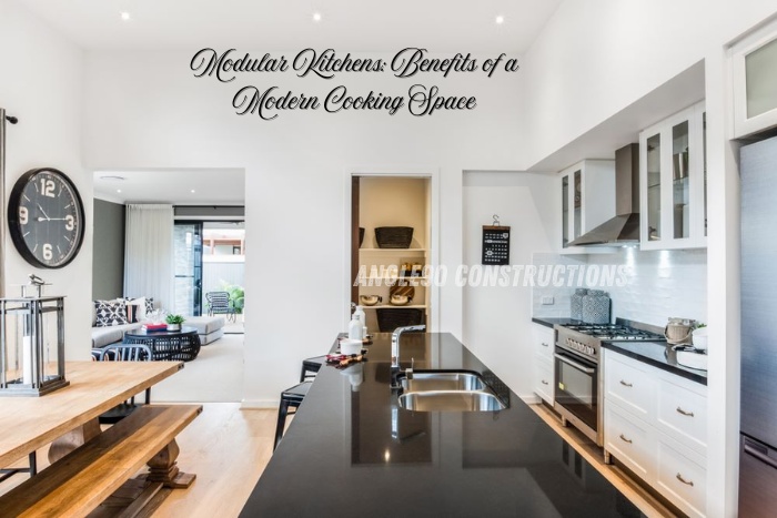 Modern modular kitchen with spacious layout and sleek finishes, designed by Angle90 Constructions in Coimbatore