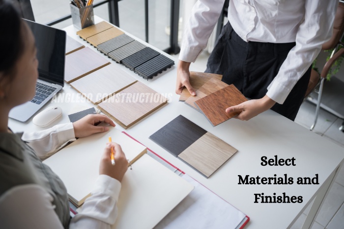 Elevation design for commercial buildings in Coimbatore, showcasing modern glass façade and strong architectural lines by Angle90 Constructions