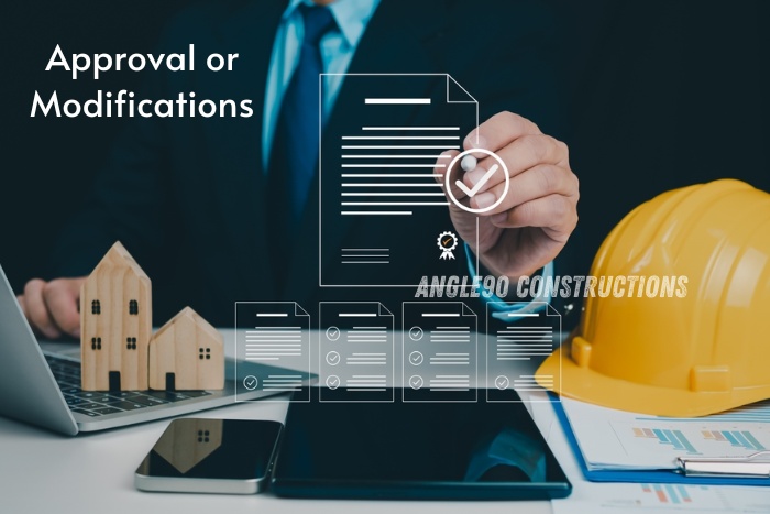 Construction approval and modification services by Angle90 Constructions in Coimbatore, showing expert reviewing building documents